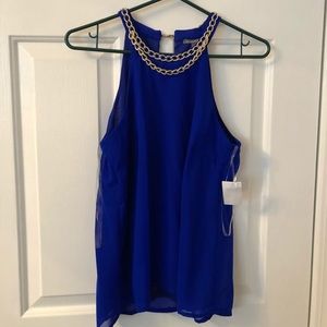 Royal blue shirt that flows at the waist